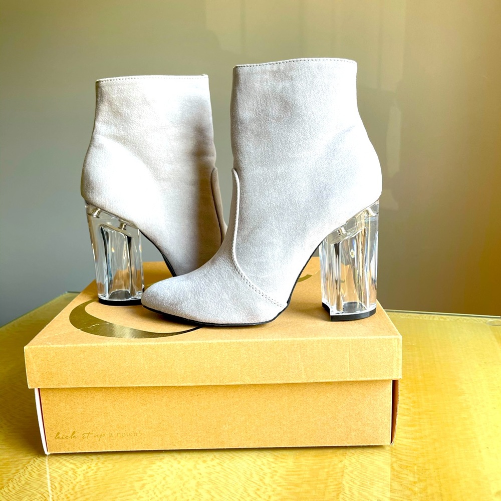 Booties with clear heel
